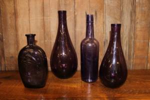 Assorted Purple Bottles-L Vintique Rental WI