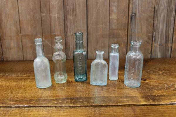 Assorted Sea Green Bottles-S Vintique Rental WI